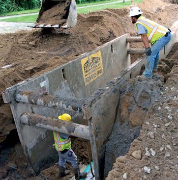 workers in trench 